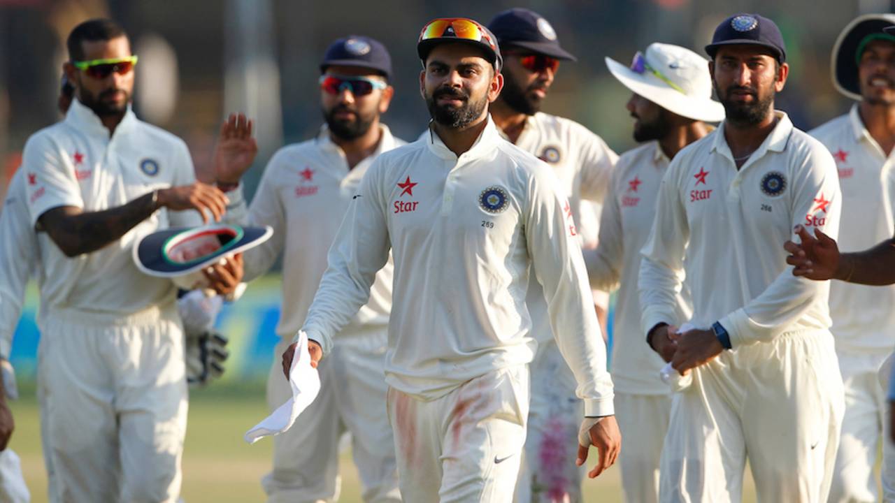 Virat Kohli leads his team off after a strong day for India, India v New Zealand, 1st Test, Kanpur, 4th day, September 25, 2016