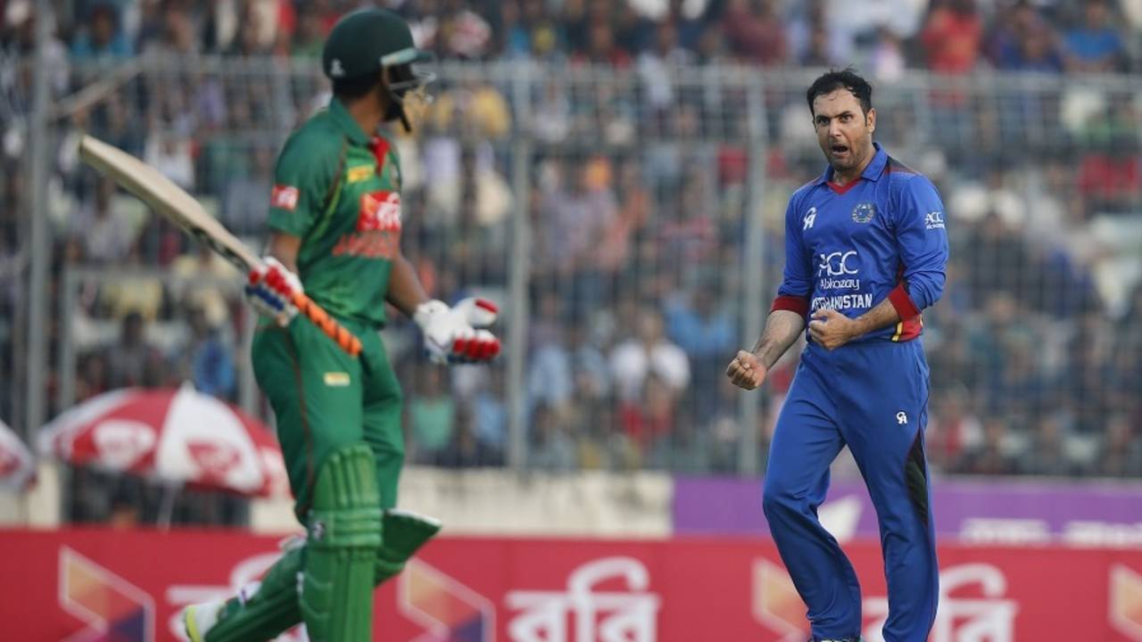 "No single there!" Nabi roars in delight after one of his two wickets&nbsp;&nbsp;&bull;&nbsp;&nbsp;Associated Press