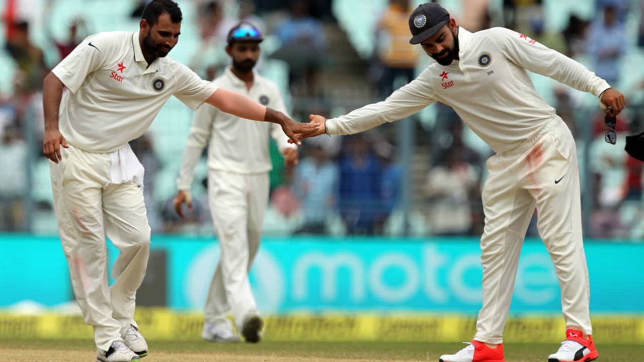 Mohammed Shami reaches out to high five his captain, India v New Zealand, 2nd Test, Kolkata, 3rd day, October 2, 2016