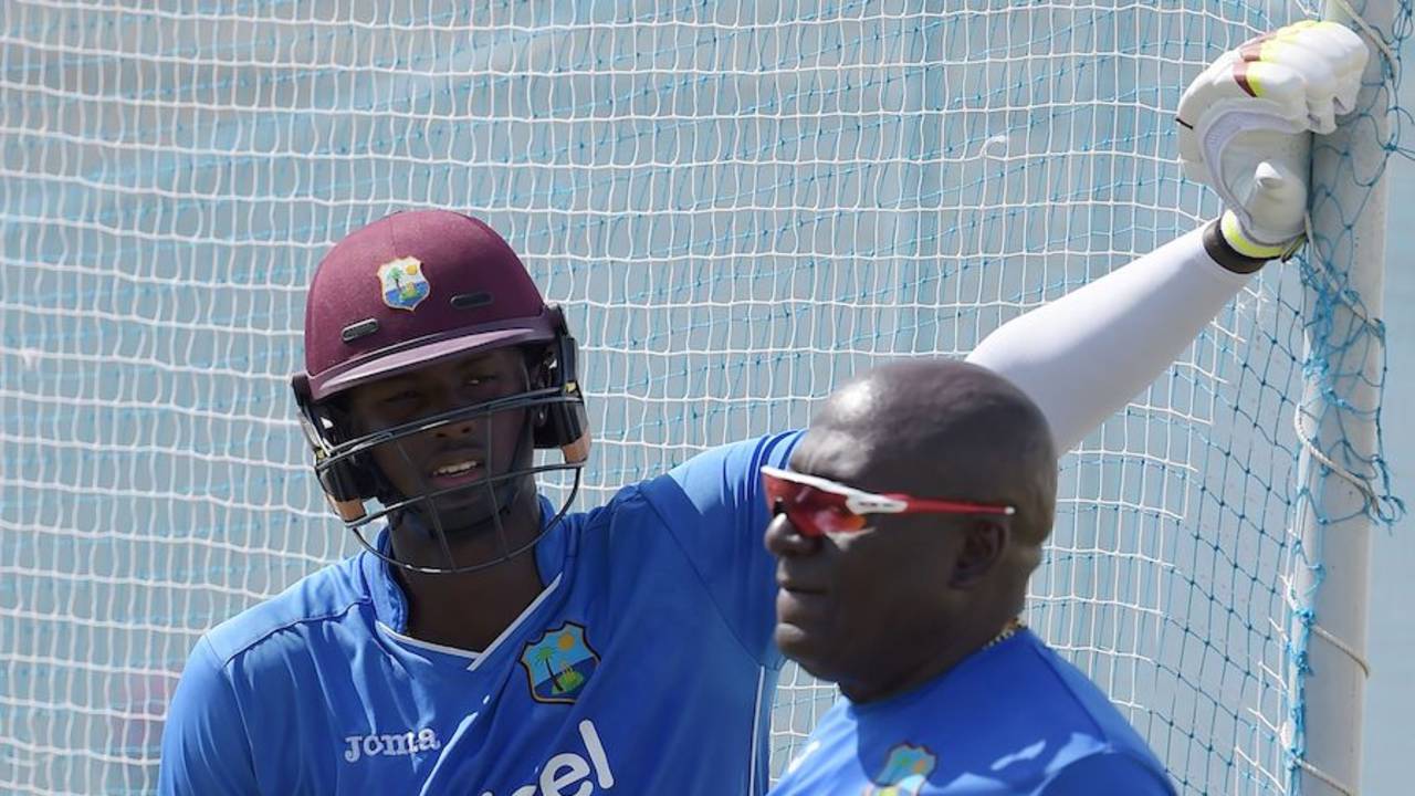 Jason Holder and West Indies assistant coach Roddy Estwick at the nets