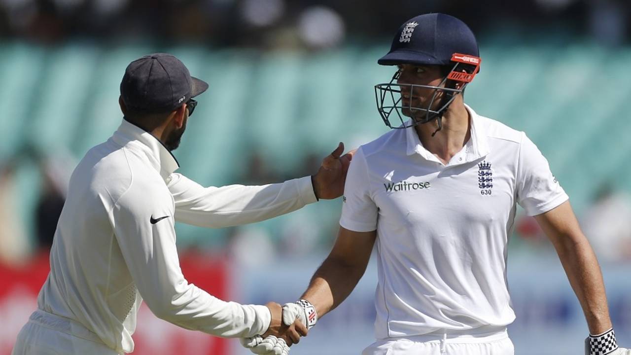 Alastair Cook is congratulated by Virat Kohli after getting to a century, India v England, 1st Test, Rajkot, 5th day, November 13, 2016