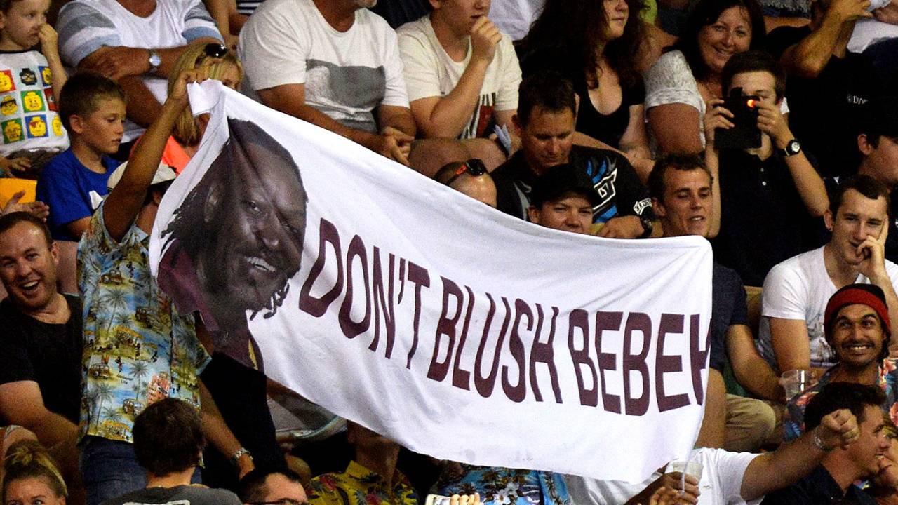 Spectators hold up a banner referring to Chris Gayle's comments to a female sports presenter, Brisbane Heat v Adelaide Strikers, BBL 2015-16, Brisbane, January 8, 2016