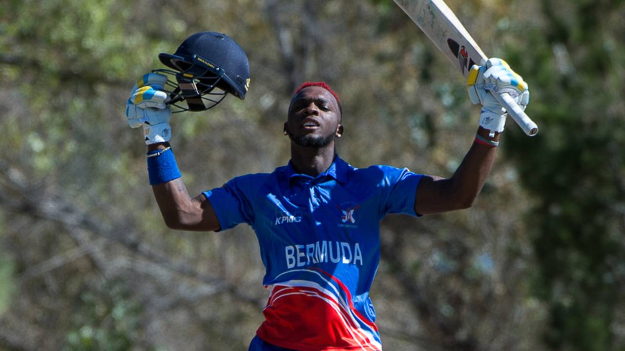 Kamau Leverock raises his bat upon reaching his century off 96 balls, Bermuda v Jersey, ICC World Cricket League Division Four, Los Angeles, November 2, 2016