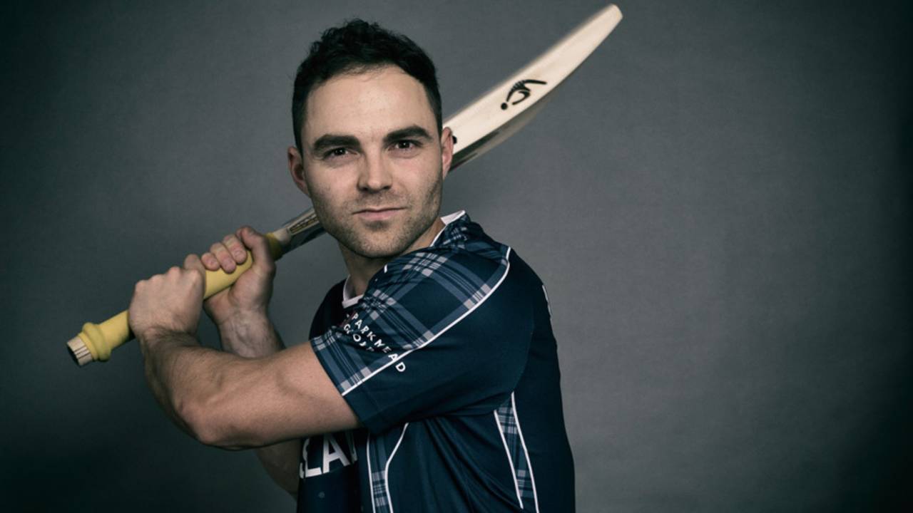 Scotland captain Preston Mommsen strikes a pose while holding a bat, World T20, Mohali, March 2, 2016