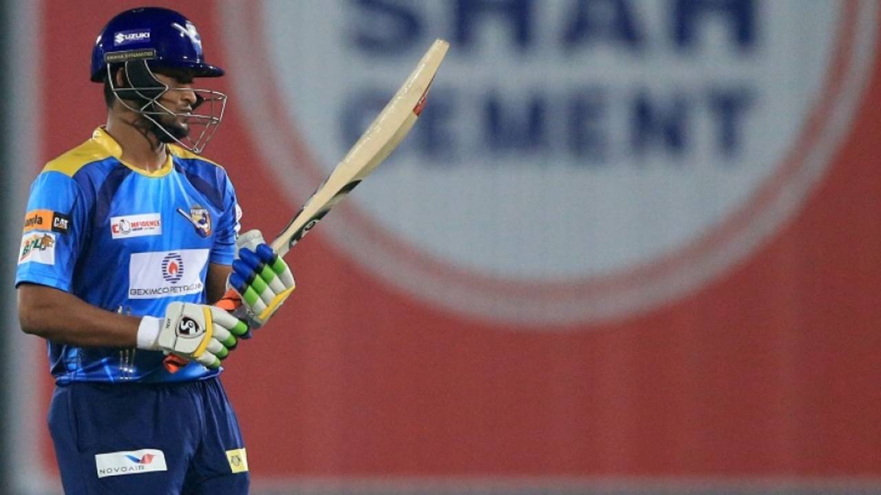 Shakib Al Hasan inspects his bat after a shot, Dhaka Dynamites v Khulna Titans, Bangladesh Premier League, Qualifier 1, Dhaka, December 6, 2016