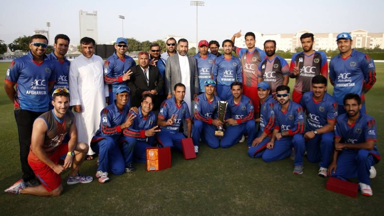 Afghanistan players and staff pose for a picture after their 44-run win, United Arab Emirates v Afghanistan, 3rd T20I, Dubai, December 18, 2016