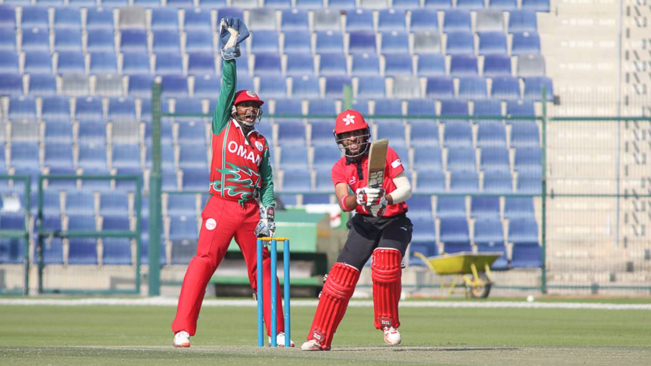 Sultan Ahmed belts out a successful appeal after Zeeshan Maqsood traps Waqas Khan, Hong Kong v Oman, Desert T20, Group B, Abu Dhabi, January 16, 2017
