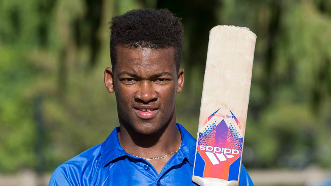 Delray Rawlins poses with his bat at Woodley Park, ICC World Cricket League Division Four, Los Angeles, November 1, 2016