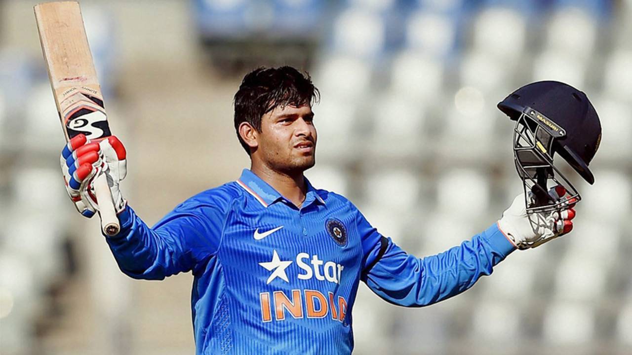 Himanshu Rana raises his bat after reaching a century, India v England, 1st Under-19 ODI, Mumbai, January 30, 2017