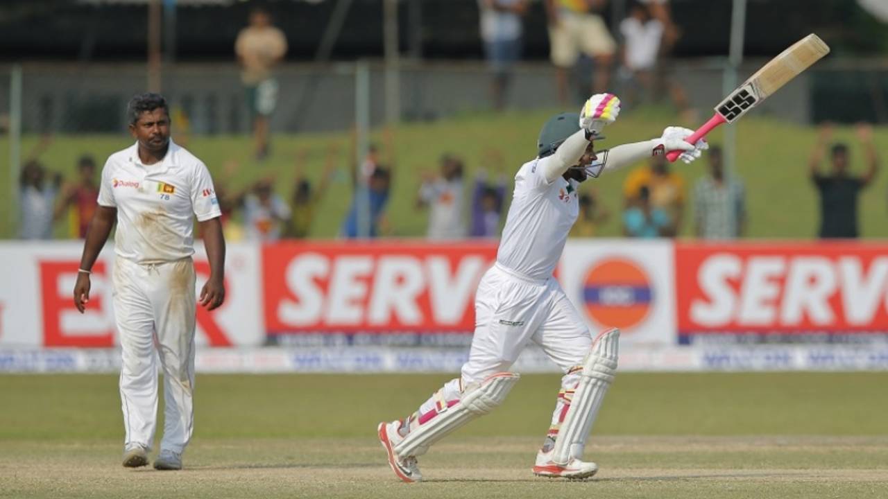 Mushfiqur Rahim celebrates Bangladesh's four-wicket win&nbsp;&nbsp;&bull;&nbsp;&nbsp;Associated Press