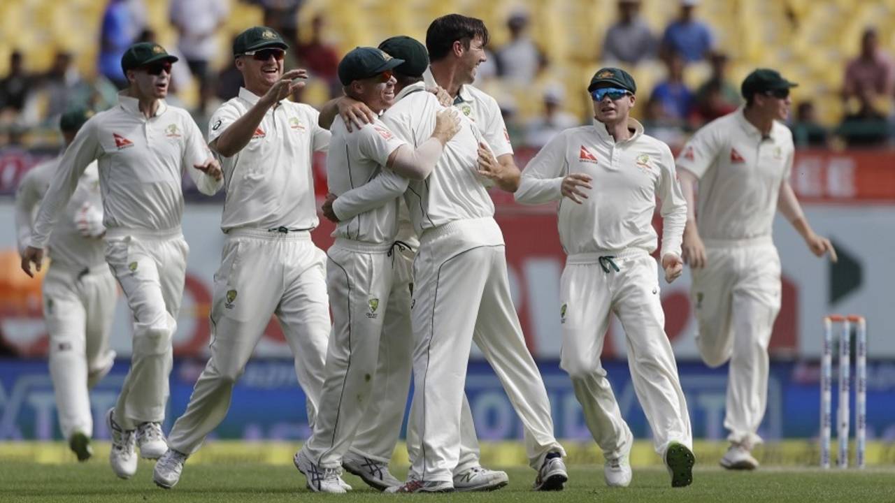 Australia's fielders celebrate after Cheteshwar Pujara's run out, India v Australia, 4th Test, Dharamsala, 4th day, March 28, 2017