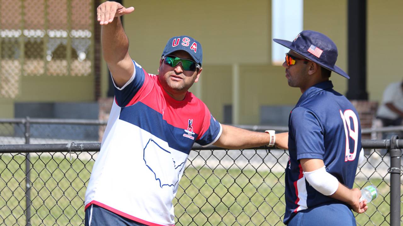 Former USA captain Sushil Nadkarni gives some batting tips to Ravi Timbawala, Pearland, April 7, 2017