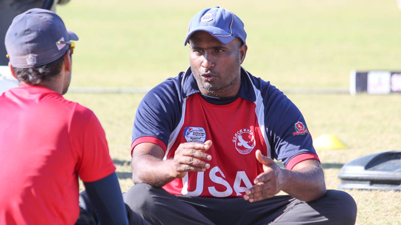 USA U-19 coach Thiru Kumaran discusses bowling strategy with Ali Khan, Pearland, April 7, 2017
