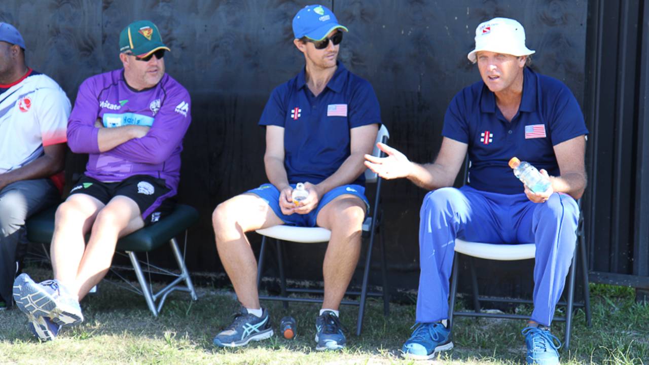 Peter Anderson (right), watches a USA trial match with Beau Casson (center) and Richard Allanby (left), Pearland, April 8, 2017
