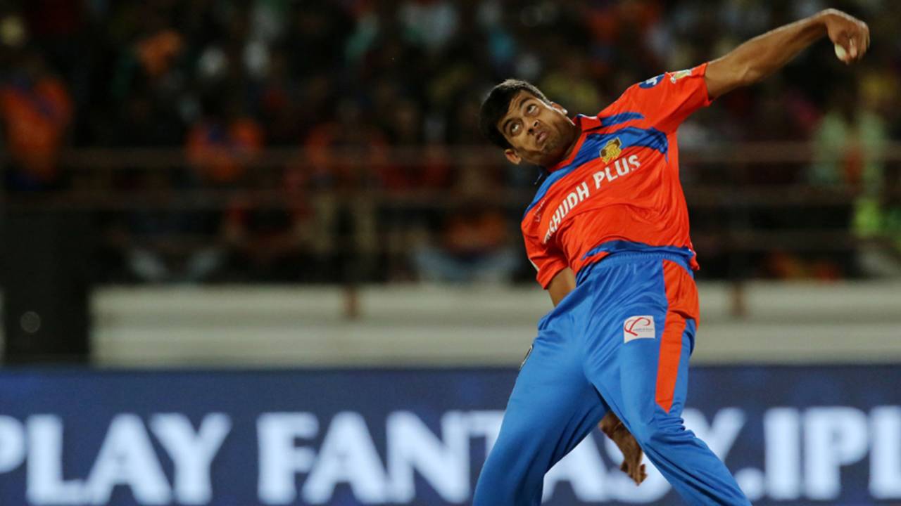 Shivil Kaushik in his delivery stride, Royal Challengers Bangalore v Gujarat Lions, Rajkot, IPL 2017, April 18, 2017