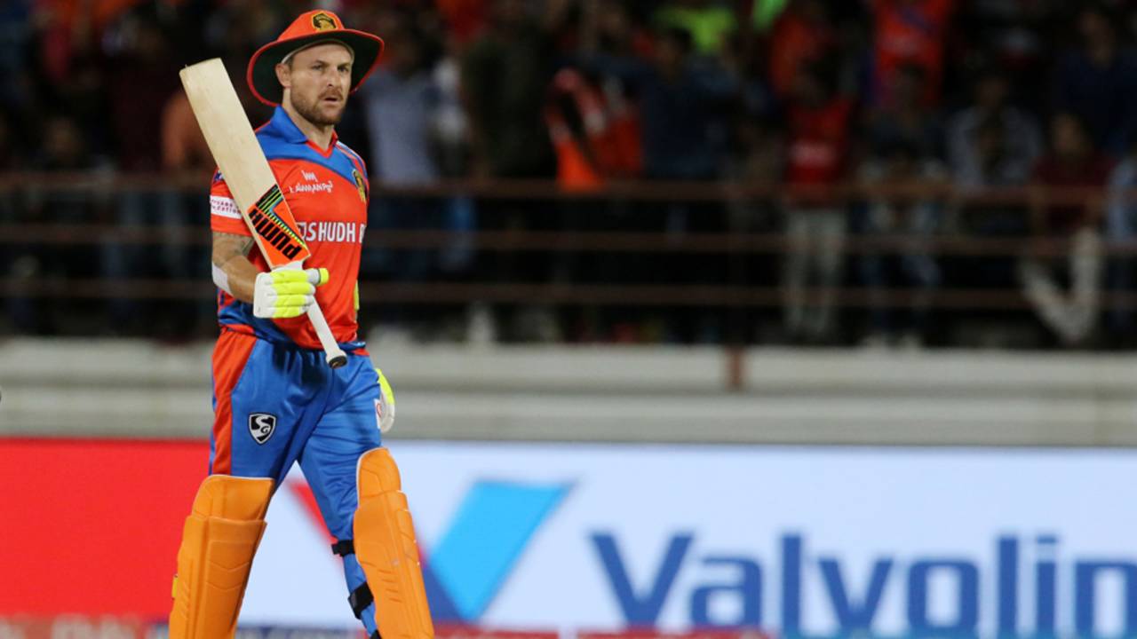 Brendon McCullum raises his bat after notching up his half-century, Royal Challengers Bangalore v Gujarat Lions, Rajkot, IPL 2017, April 18, 2017