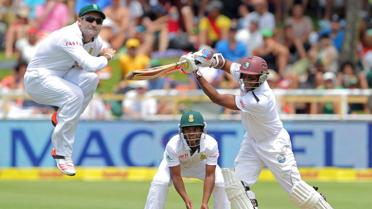 Dean Elgar jumps to avoid a shot from Shivnarine Chanderpaul, South Africa v West Indies, 3rd Test, Cape Town, 1st day, January 2, 2015