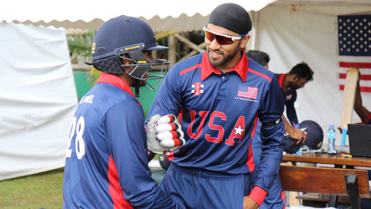 Jessy Singh gives Sagar Patel encouragement as he gets ready to debut, Oman v USA, ICC World Cricket League Division Three, Entebbe, May 23, 2017