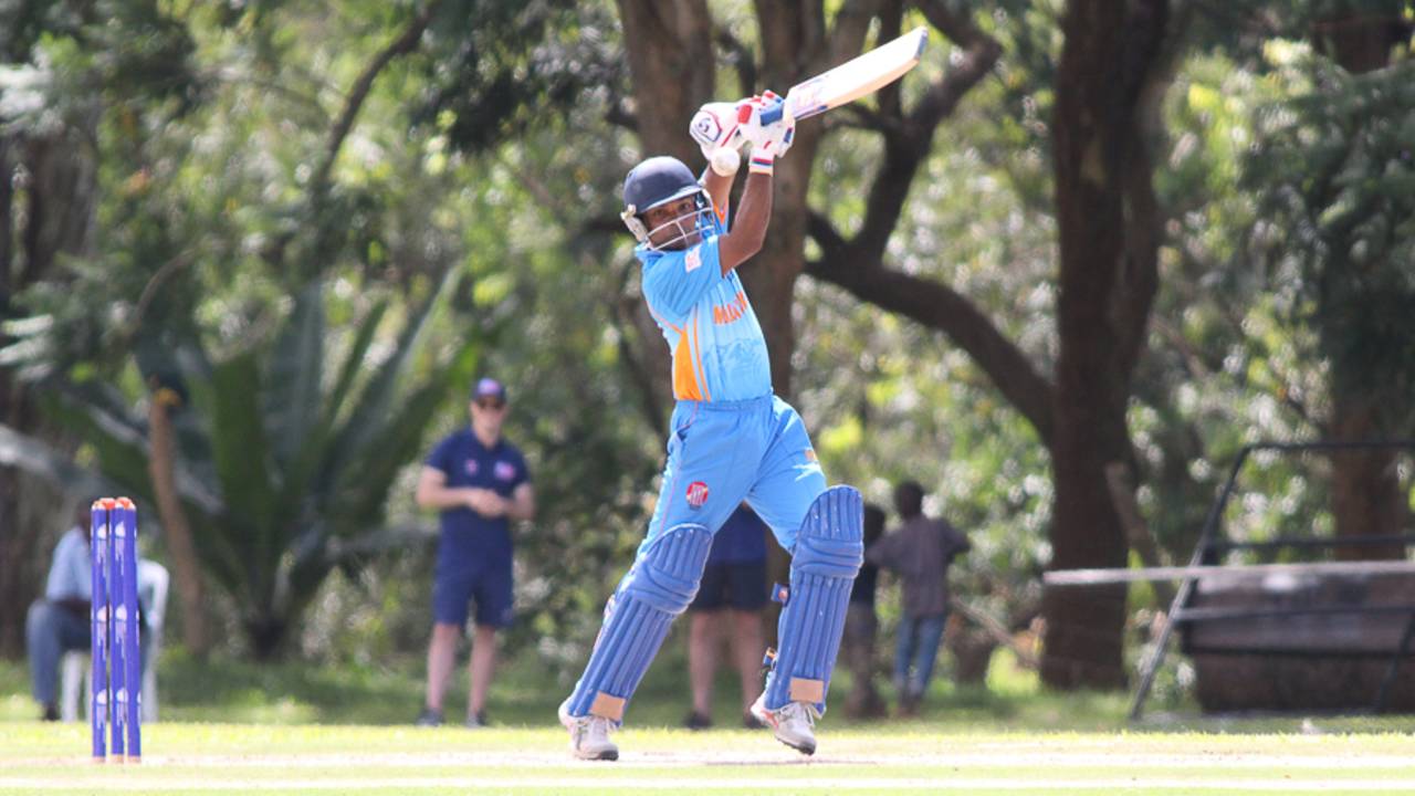 Neville Liyanage drives through cover for a boundary during his 30, Malaysia v USA, ICC World Cricket League Division Three, Kampala, May 24, 2017
