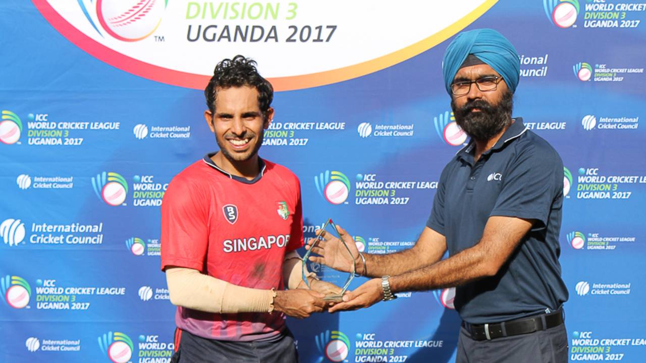 Arjun Mutreja accepts the Man of the Match award from ICC official Gurjit Singh, Singapore v USA, ICC World Cricket League Division Three, Kampala, May 26, 2017