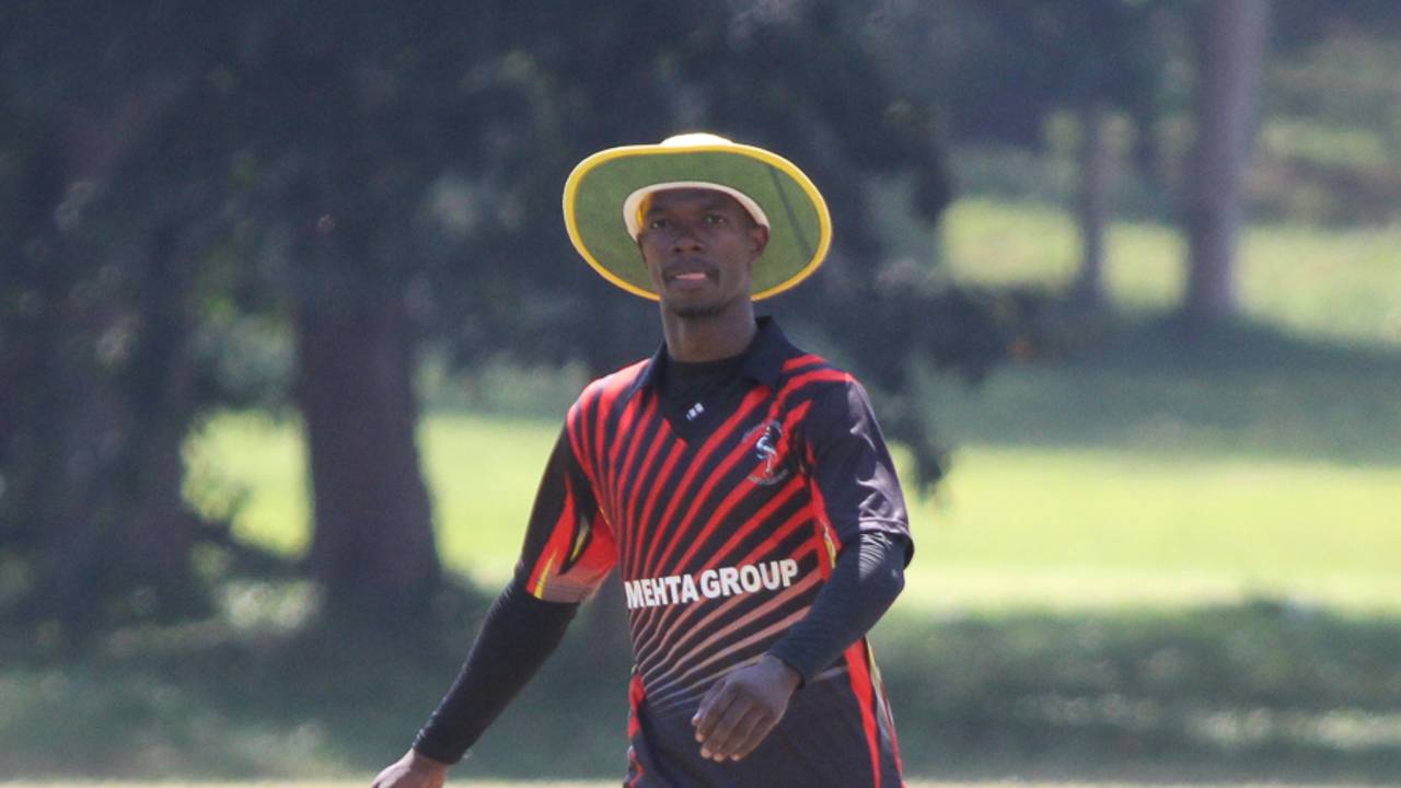 Uganda captain Davis Karashani checks his field settings