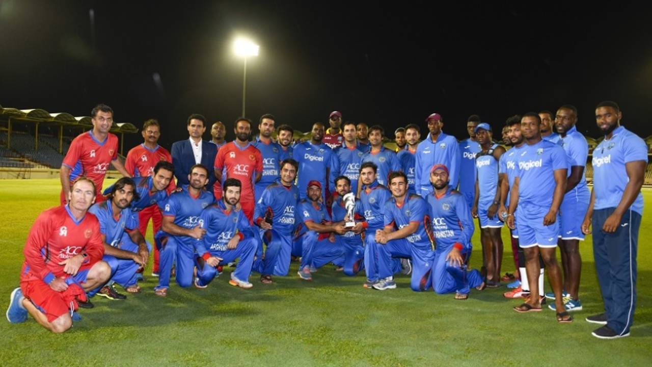 West Indies and Afghanistan players pose for a photograph after the third ODI was washed out, West Indies v Afghanistan, 3rd ODI, St Lucia, June 14, 2017