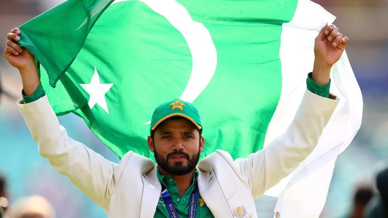 Azhar Ali holds the Pakistan flag aloft after their win in the final, India v Pakistan, Final, Champions Trophy 2017, The Oval, London, June 18, 2017