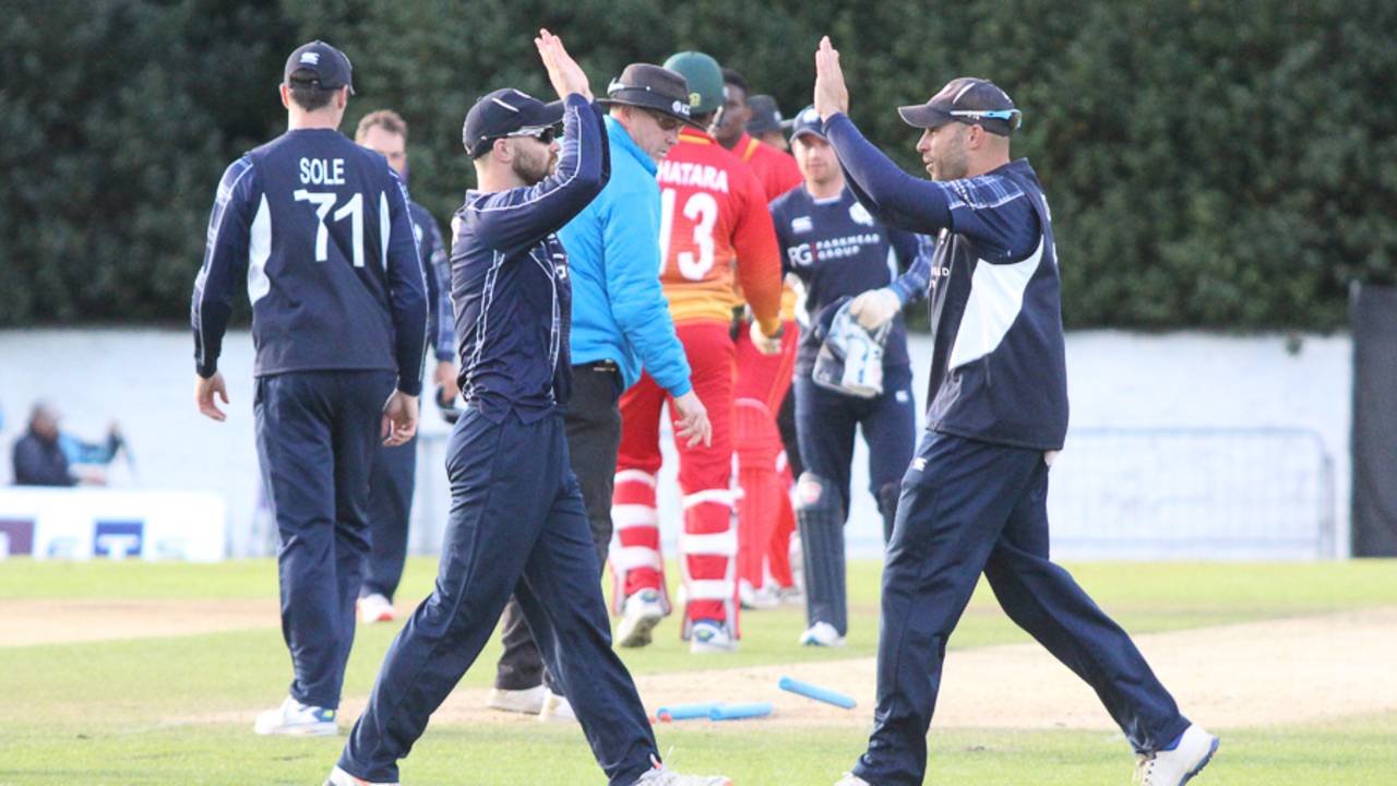 Preston Mommsen and captain Kyle Coetzer celebrate Scotland's first ODI win over a Full Member, Scotland v Zimbabwe, 1st ODI, Edinburgh, June 15, 2017
