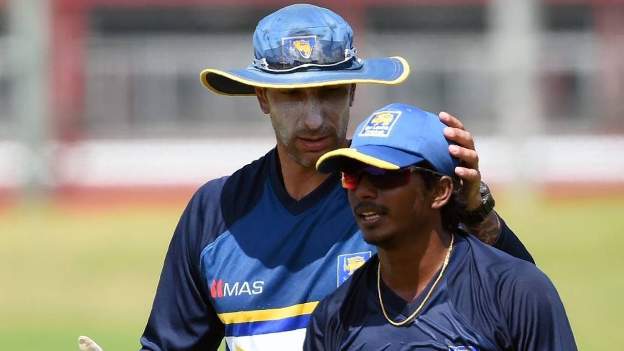 Nic Pothas, Sri Lanka's interim coach, with Lakshan Sandakan during a training session, Galle, June 29, 2017