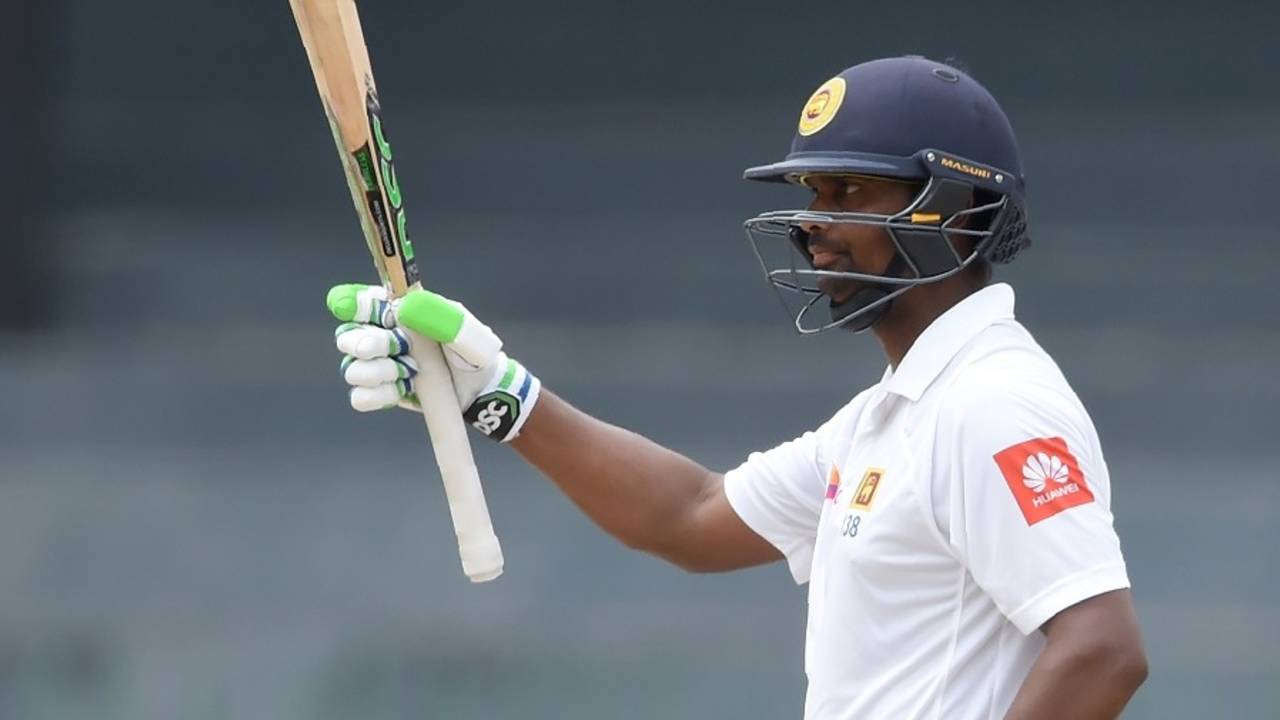 Asela Gunaratne acknowledges his fifty, Sri Lanka v Zimbabwe, only Test, 5th day, Colombo, July 18, 2017