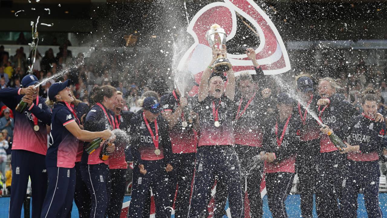 England captain Heather Knight lifts the World Cup amid showers of champagne, England v India, Women's World Cup final, Lord's, July 23, 2017