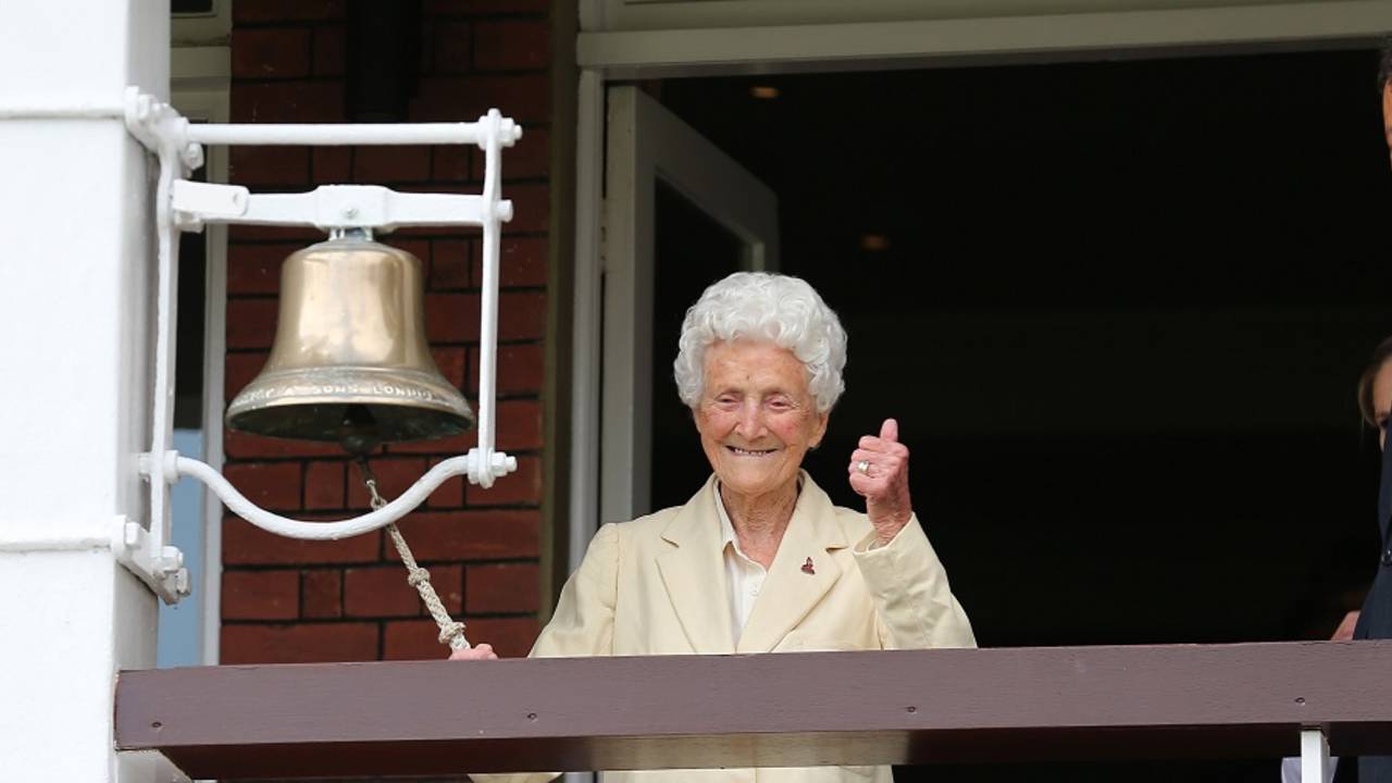 Eileen Ash, the oldest living Test cricketer, rings the bell before the match