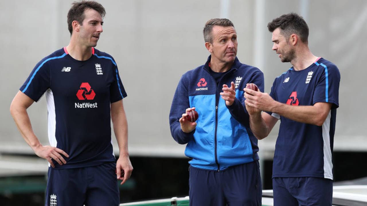 Toby Roland-Jones and James Anderson gets some tips from Dominic Cork, Old Trafford, August 2, 2017