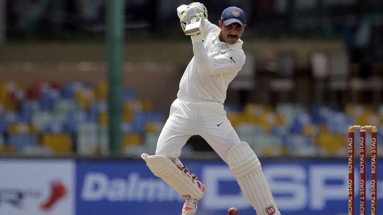 Ravindra Jadeja punches with a high elbow, Sri Lanka v India, 2nd Test, SSC, 2nd day, Colombo, August 4, 2017