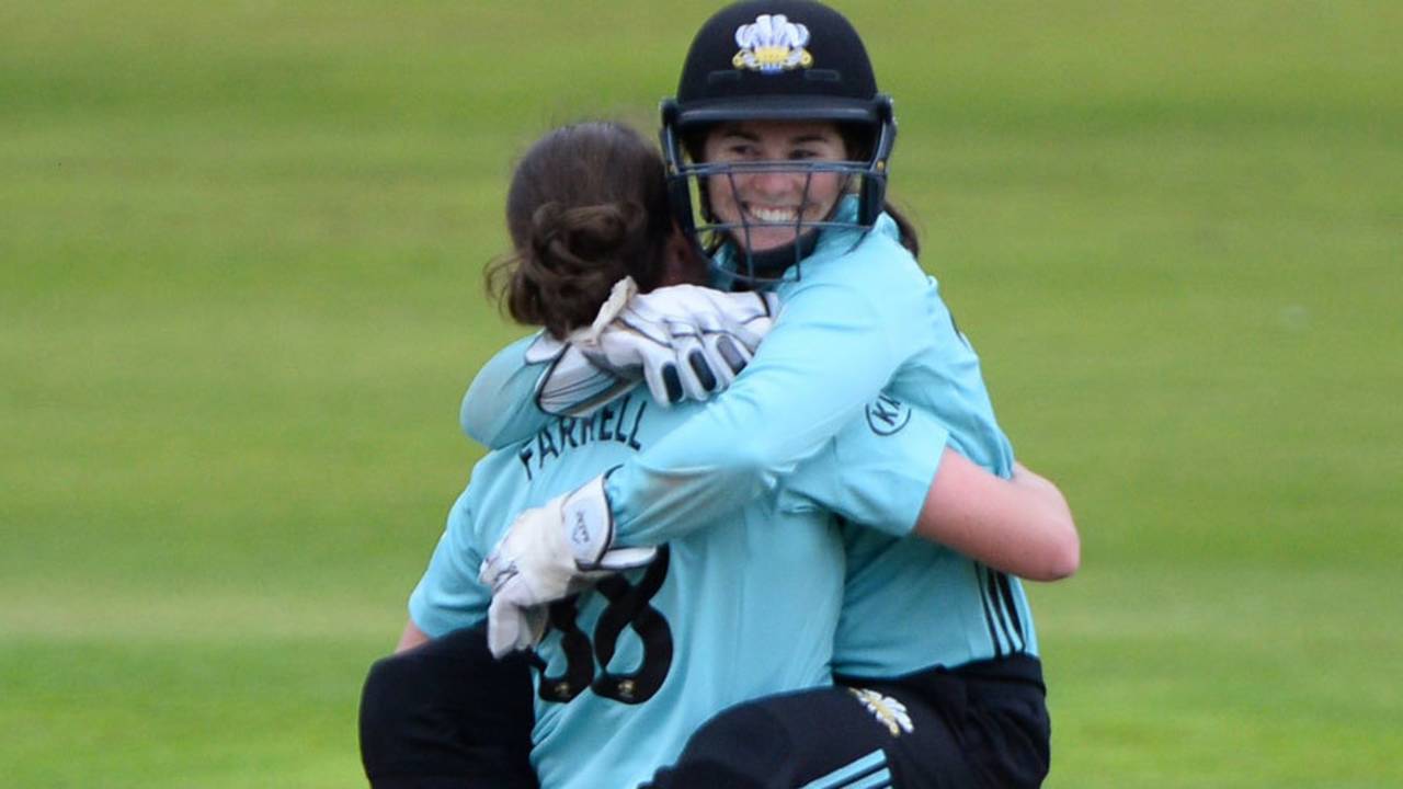 Rene Farrell gets a hug from Tammy Beaumont after sealing victory, Lancashire Thunder v Surrey Stars, Kia Super League, Old Trafford, August 16, 2017