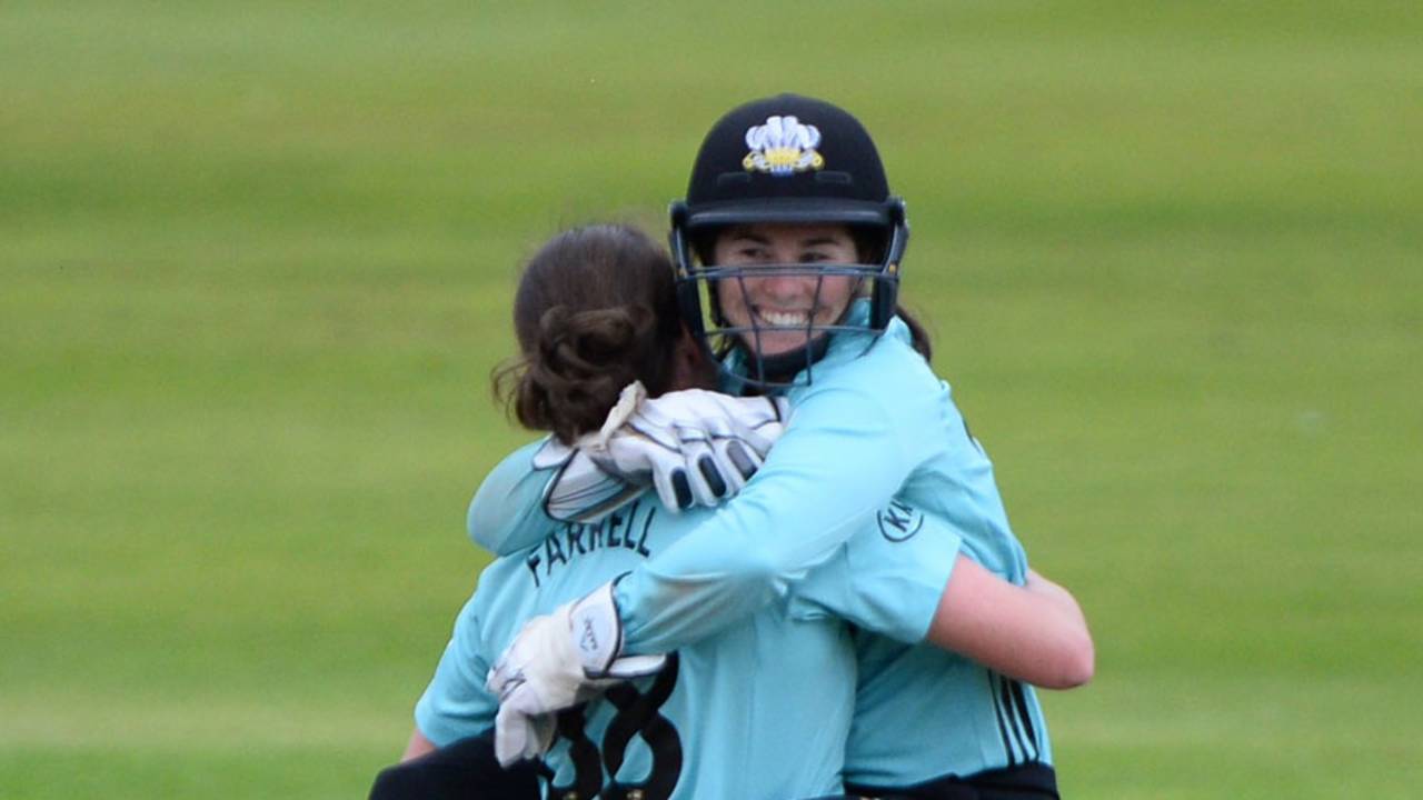 Rene Farrell gets a hug from Tammy Beaumont after sealing victory, Lancashire Thunder v Surrey Stars, Kia Super League, Old Trafford, August 16, 2017