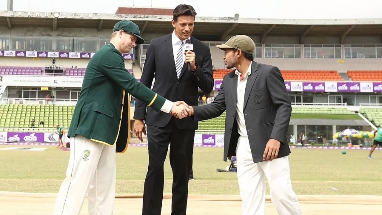 Steven Smith and Mushfiqur Rahim shake hands at the toss as Brendon Julian watches on, Bangladesh v Australia, 1st Test, Mirpur, 1st day, August 27, 2017