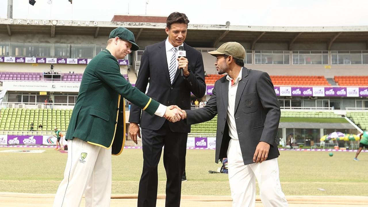 Steven Smith and Mushfiqur Rahim shake hands at the toss as Brendon Julian watches on, Bangladesh v Australia, 1st Test, Mirpur, 1st day, August 27, 2017