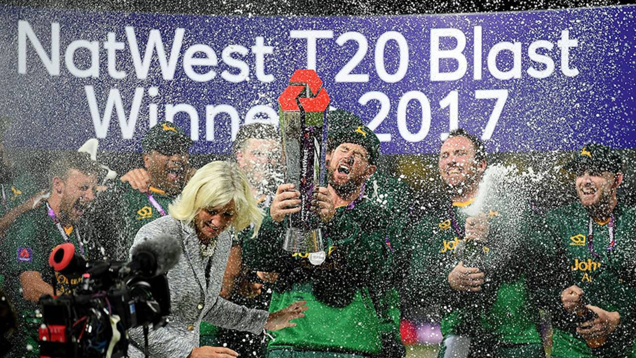 Dan Christian was covered in champagne after getting the trophy in the eye&nbsp;&nbsp;&bull;&nbsp;&nbsp;Getty Images