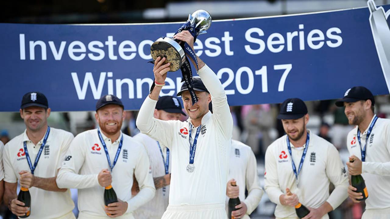 Champagne corks ready to be popped as Joe Root lifts the trophy&nbsp;&nbsp;&bull;&nbsp;&nbsp;Getty Images
