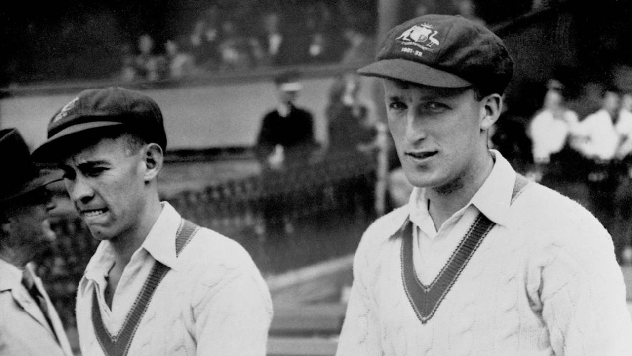 Ken Archer (left) and Graeme Hole walk out onto the field, Australia v West Indies, second Test, day one, Sydney, November 30, 1951 