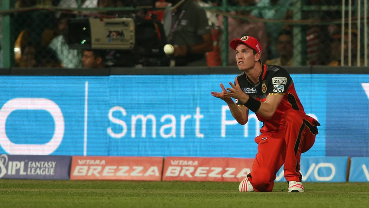 Adam Milne takes a catch to get rid of David Warner, Royal Challengers Bangalore v Sunrisers Hyderabad, IPL 2016, Bangalore, April 12, 2016