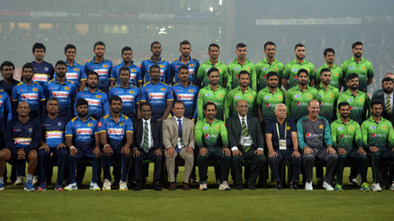 Players pose against the backdrop of packed stands in hazy Lahore&nbsp;&nbsp;&bull;&nbsp;&nbsp;Getty Images