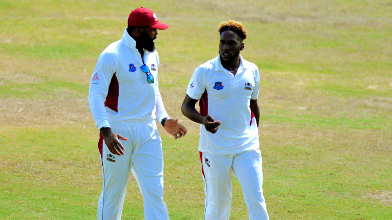 Chesney Hughes chats with Jeremiah Louis, who claimed nine wickets in the game and scored an unbeaten 62, Barbados v Leeward Islands, Regional Four-Day Tournament, Bridgetown, 2nd day, November 2, 2017