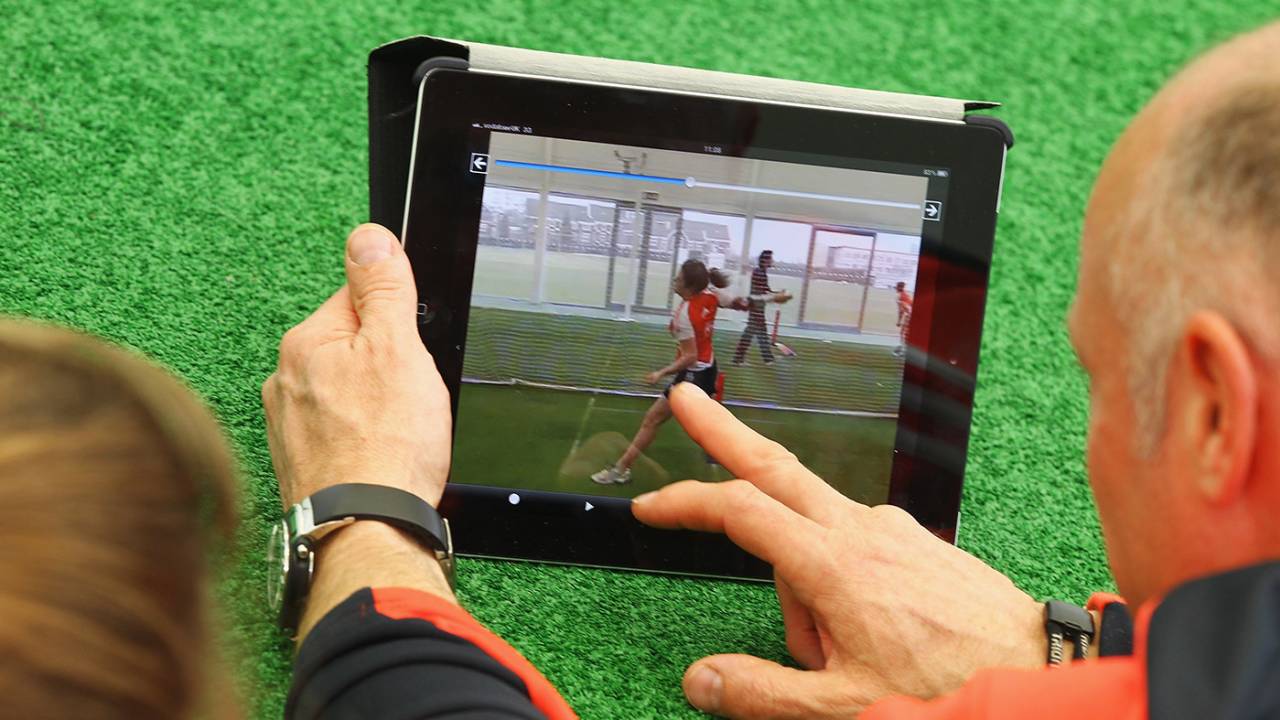 Analyst Paul Jarvis and Natalie Sciver look at a tablet with a video of Sciver's bowling on it, National Cricket Performance Centre, Loughborough, February 18, 2012