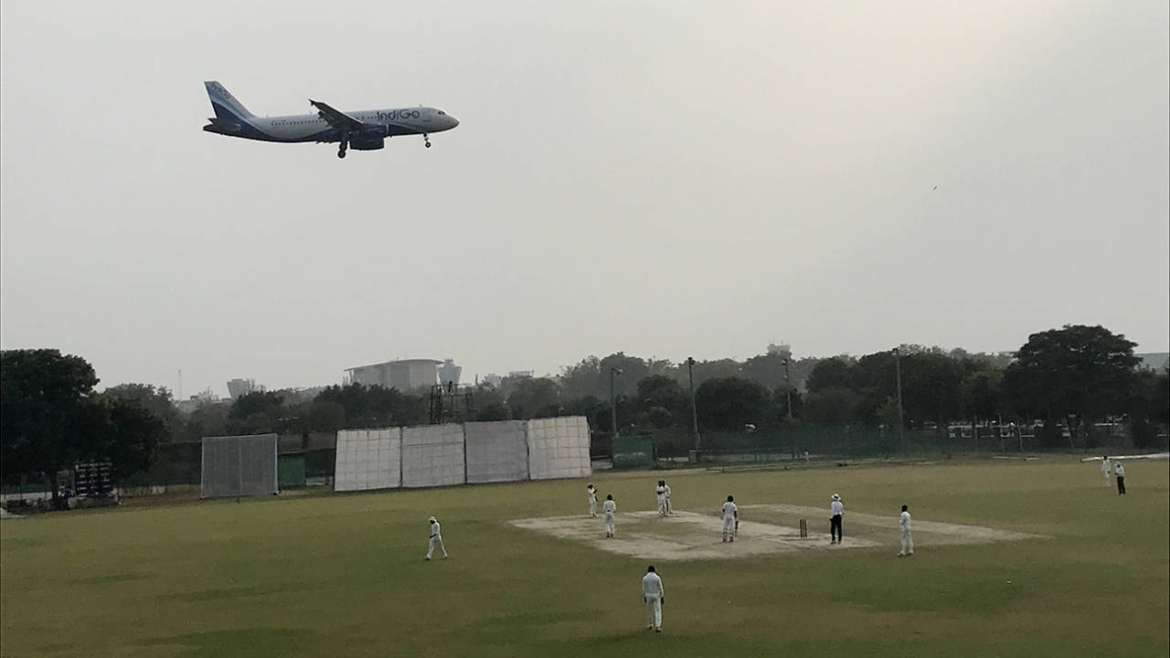 An aircraft flies over the Palam ground in Delhi, during the Delhi v Maharashtra Ranji Trophy game, Ranji Trophy 2017-18, Group A, November 17, 2017