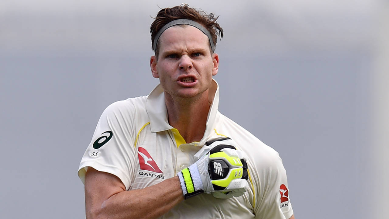Steven Smith thumps the Australia badge on his shirt after bringing up his century&nbsp;&nbsp;&bull;&nbsp;&nbsp;Saeed Khan/AFP/Getty Images)