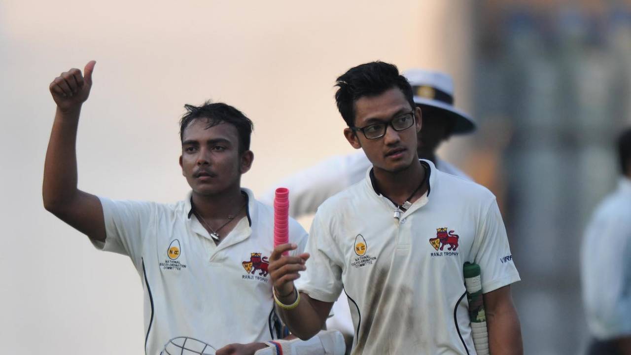 Prithvi Shaw and Jay Bista walk back after sealing Mumbai's win