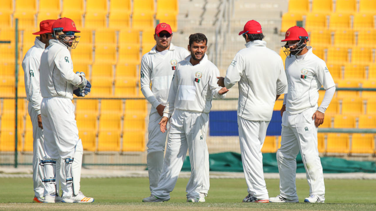 Zahir Khan gets congratulated for taking one of his three wickets, UAE v Afghanistan, 2015-17 Intercontinental Cup, 3rd day, Abu Dhabi, December 1, 2017