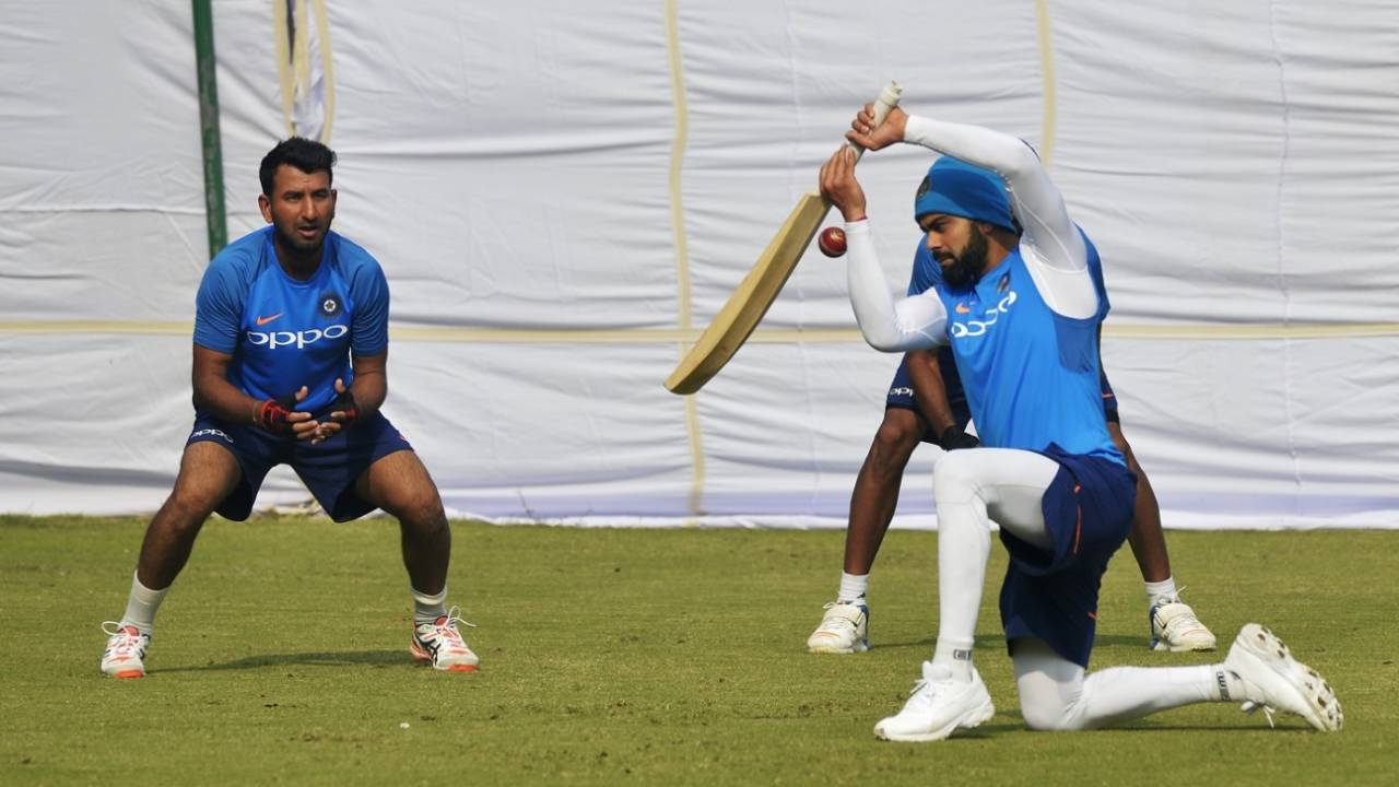 Virat Kohli provides Cheteshwar Pujara with some slip catching, Delhi, December 1, 2017